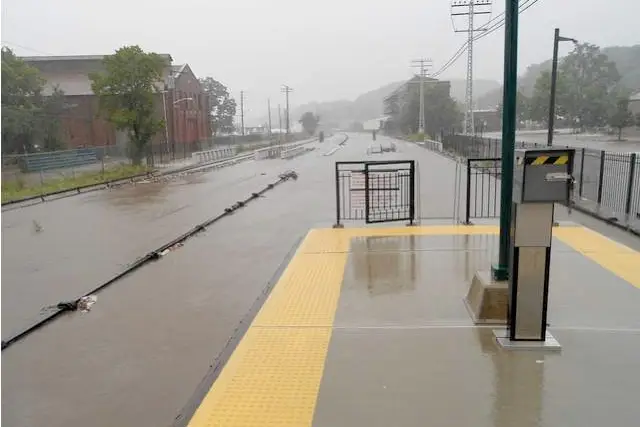 The Ossining Station during Irene, with only the third rail visible.